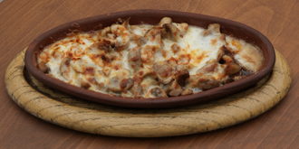 STEWED MUSHROOMS WITH CHEESE.